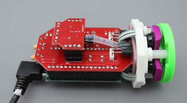The internal electronics and red board of the LipSync.