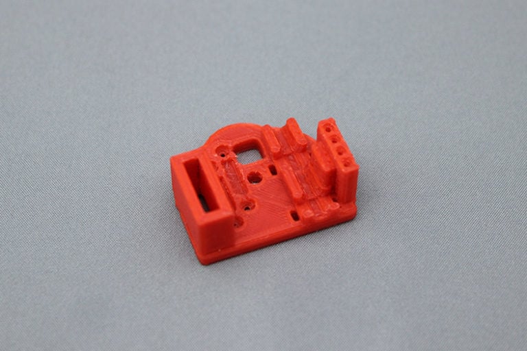 A 3D printed red part for the LipSync.