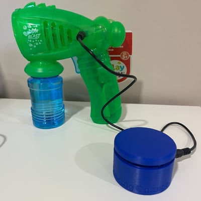 A MMC60 switch plugged into a bubble blaster toy