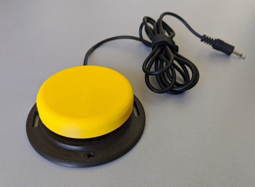 A yellow Interact Switch.