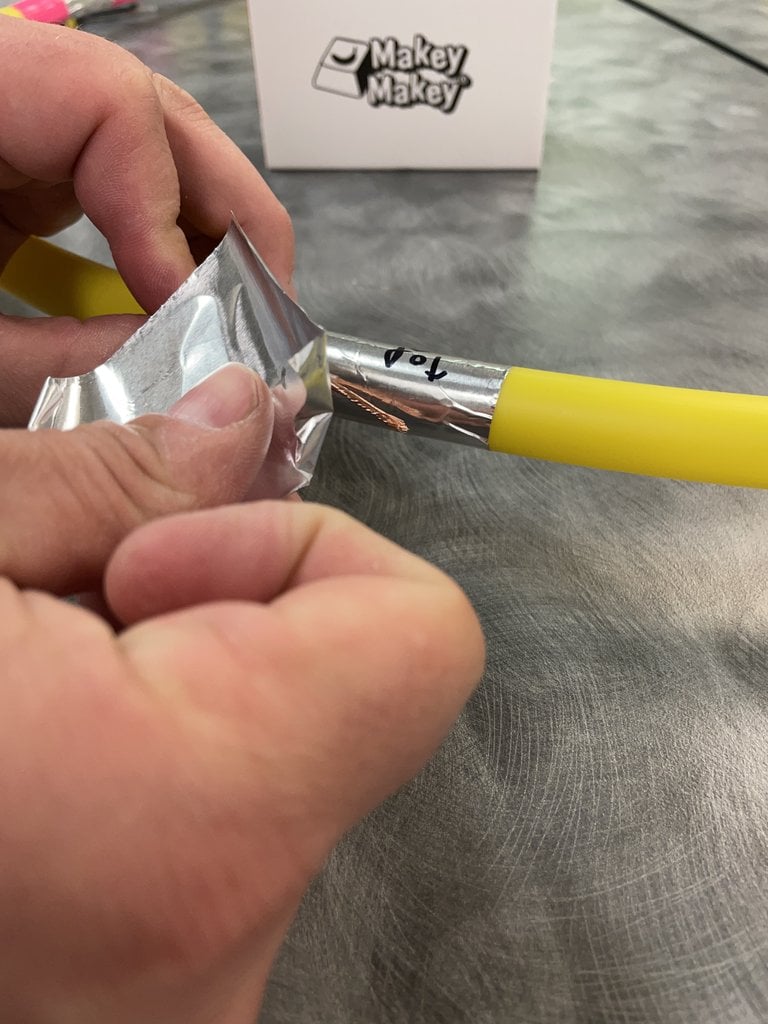 Putting extra aluminum tape over the wire to complete the circuit