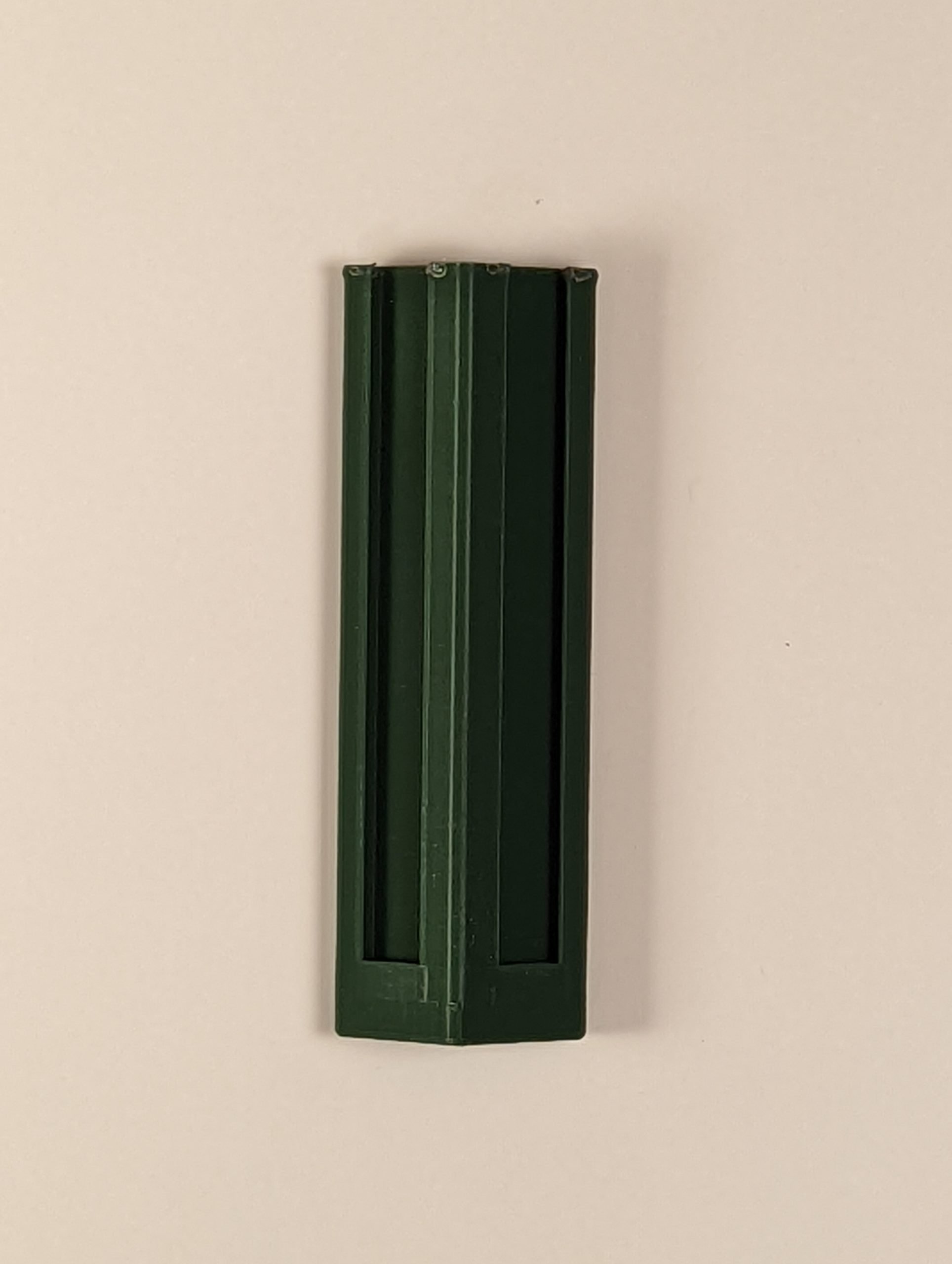 Green 3D print of the one handed nintendo controller adapter.