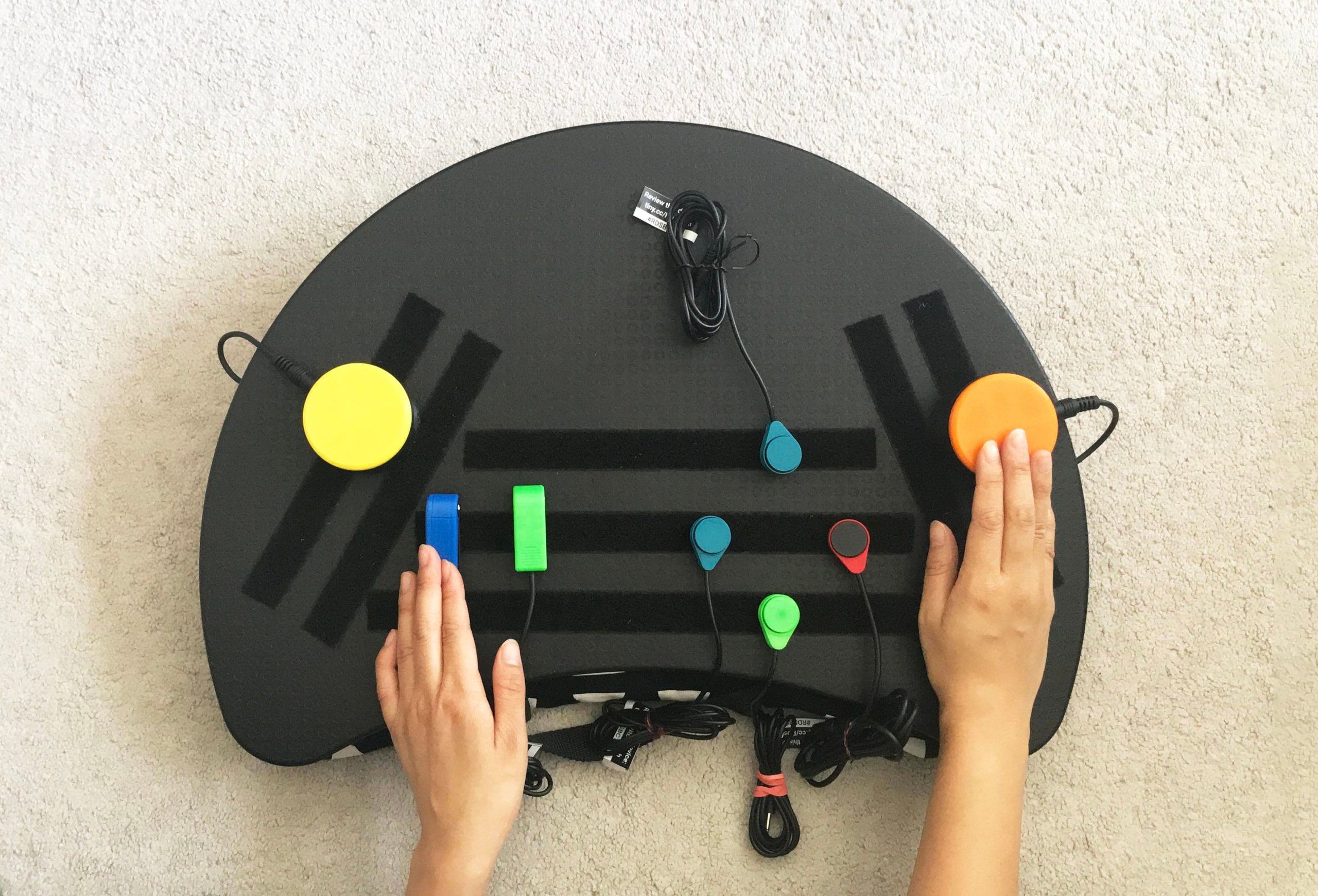 overhead view of laptop tray with switches mounted on top