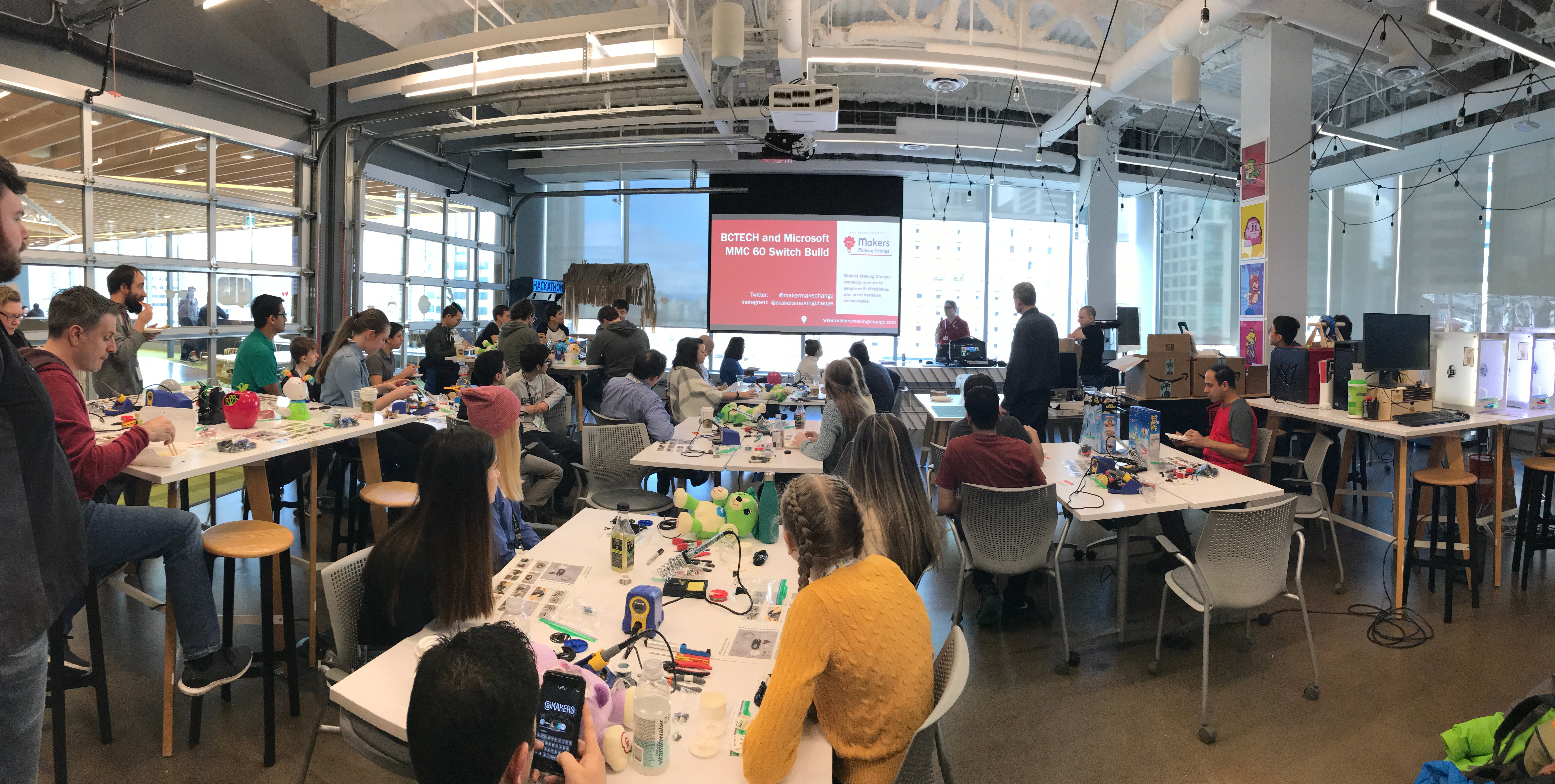 A room of youth volunteers at the Microsoft Garage.