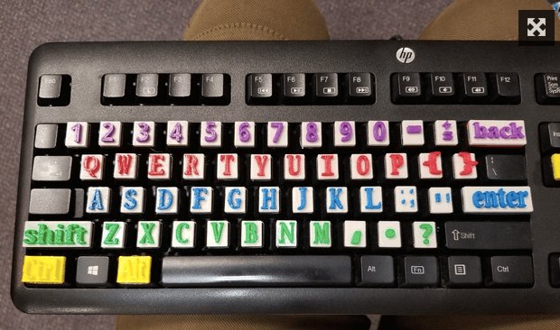 Raised keyboard letters.
