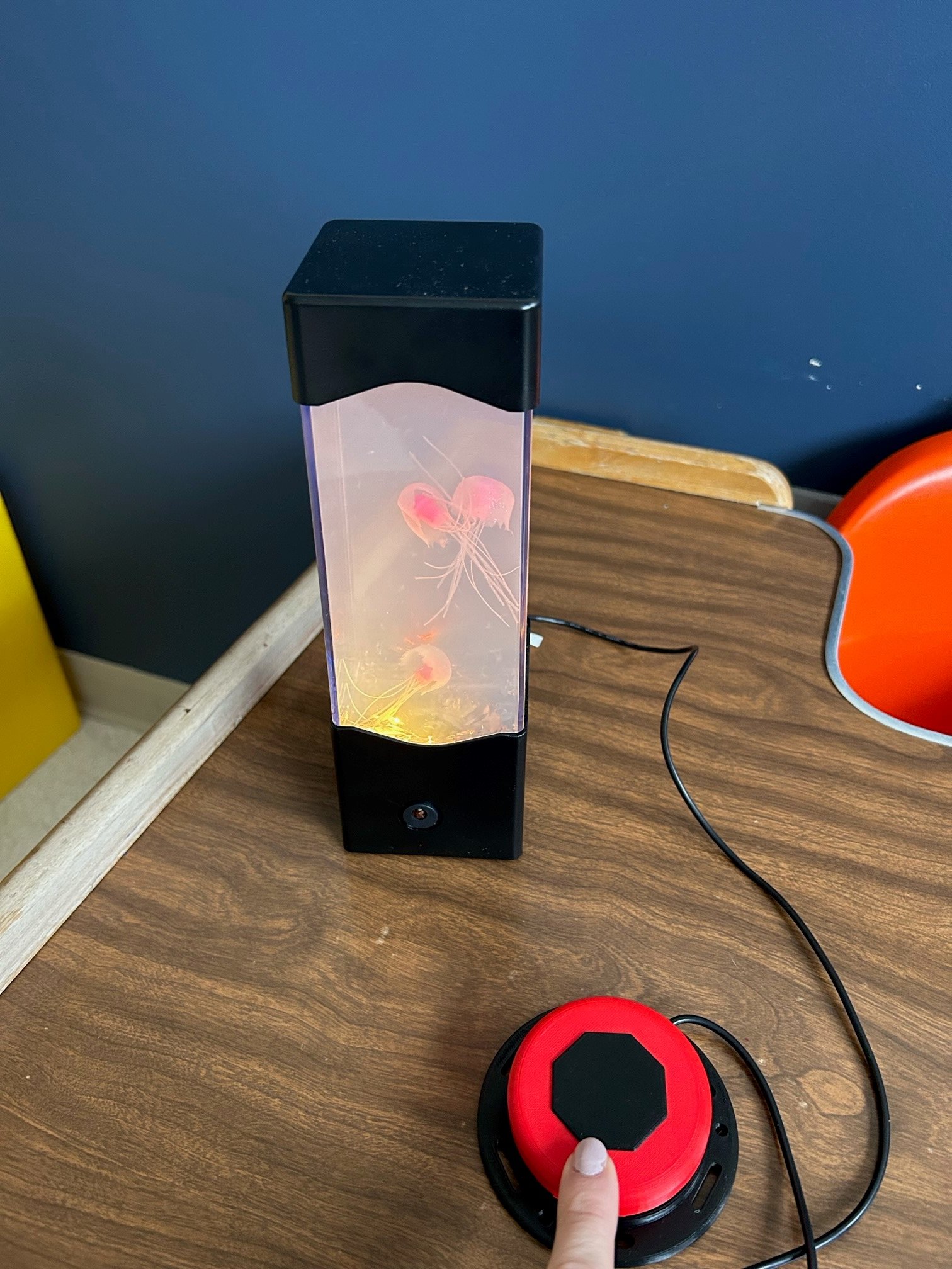 switch adapted lava lamp with a 3d printed switch plugged in