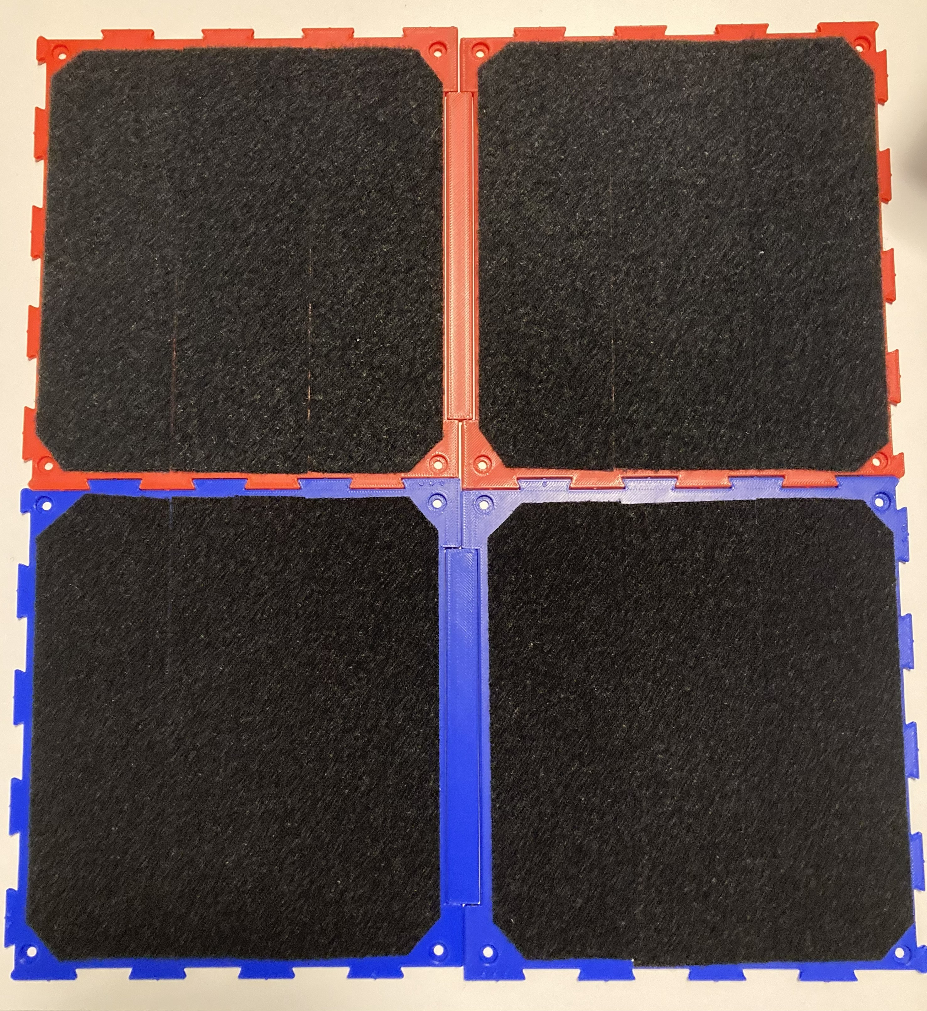 A top down view showing two Connect Board Multis connected together to form a larger square-shaped mounting surface.