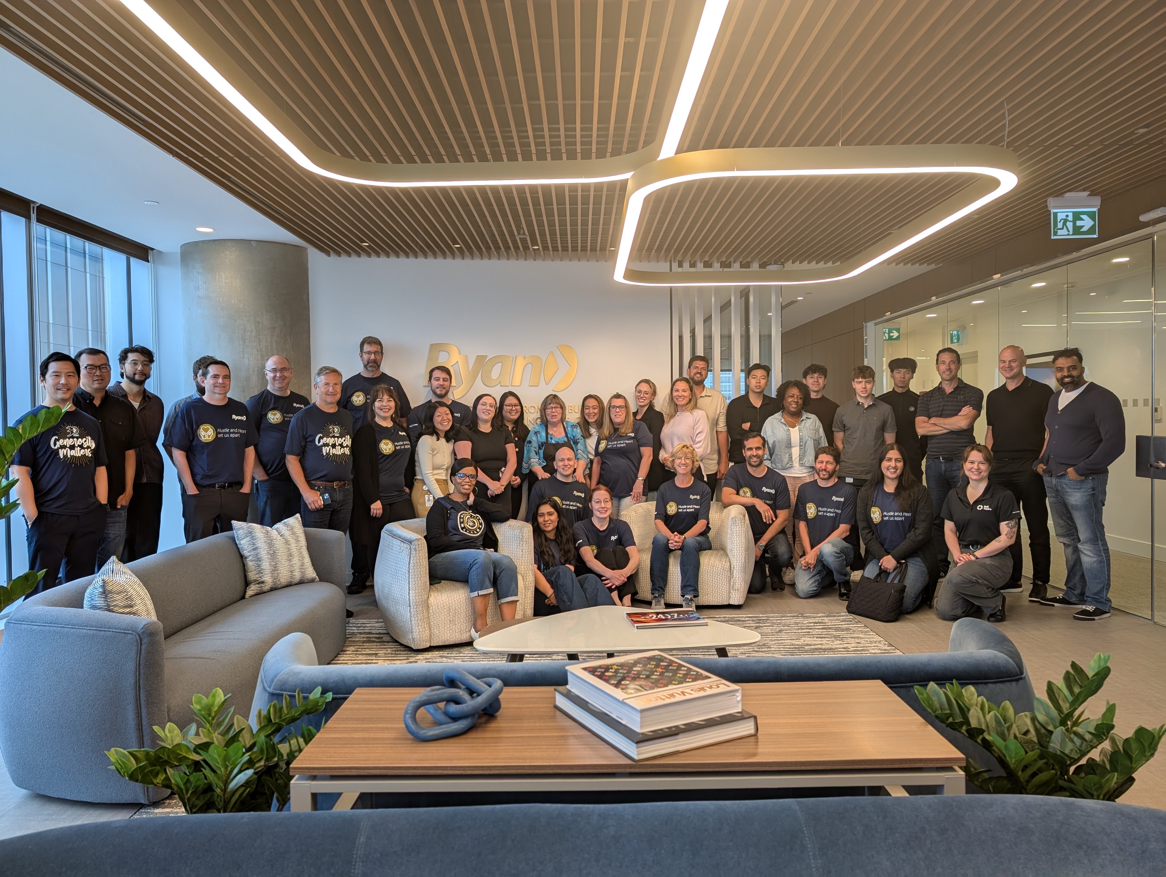 Ryan Vancouver staff stand together for a big group photo.