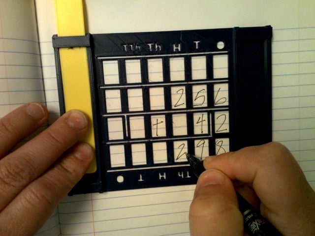 A black number aligner.