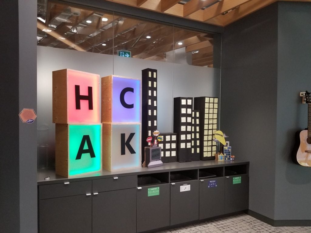 Cube blocks that spell H-A-C-K.