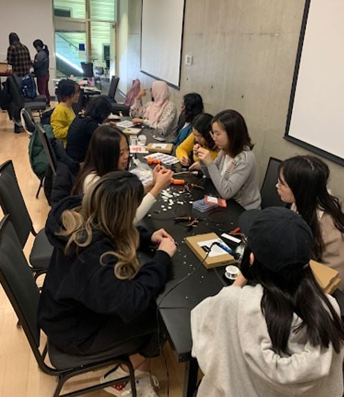 Members of UBC's Science Undergraduate Society building assistive tech.