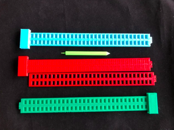 A pair of two line Braille slates