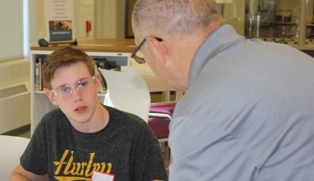 A Moncton High School student at an MMC build event.