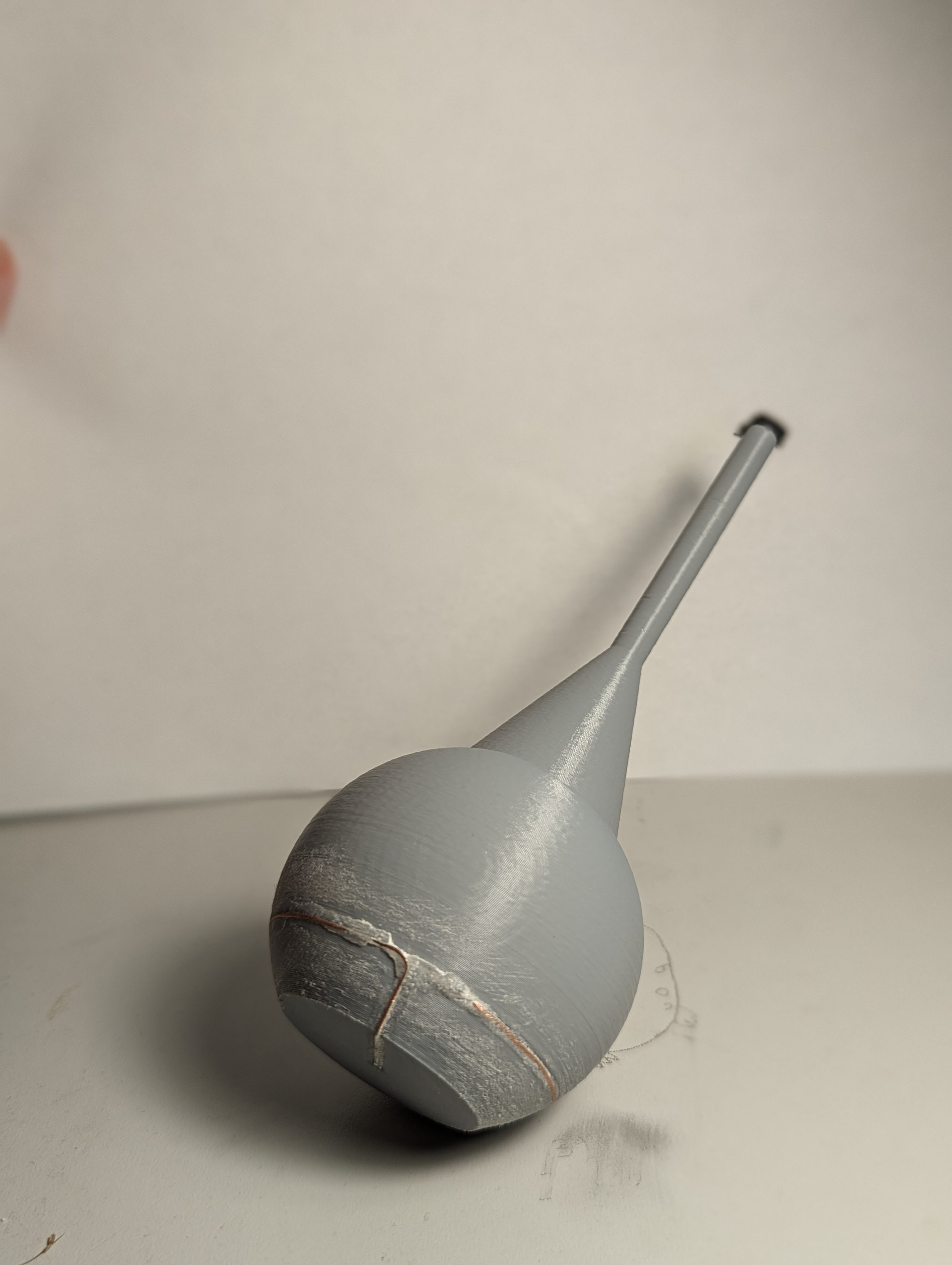 Close up of the Palm Ball Stylus sitting on a table
