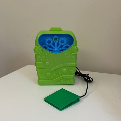 A low profile switch plugged into a rectangular bubble machine