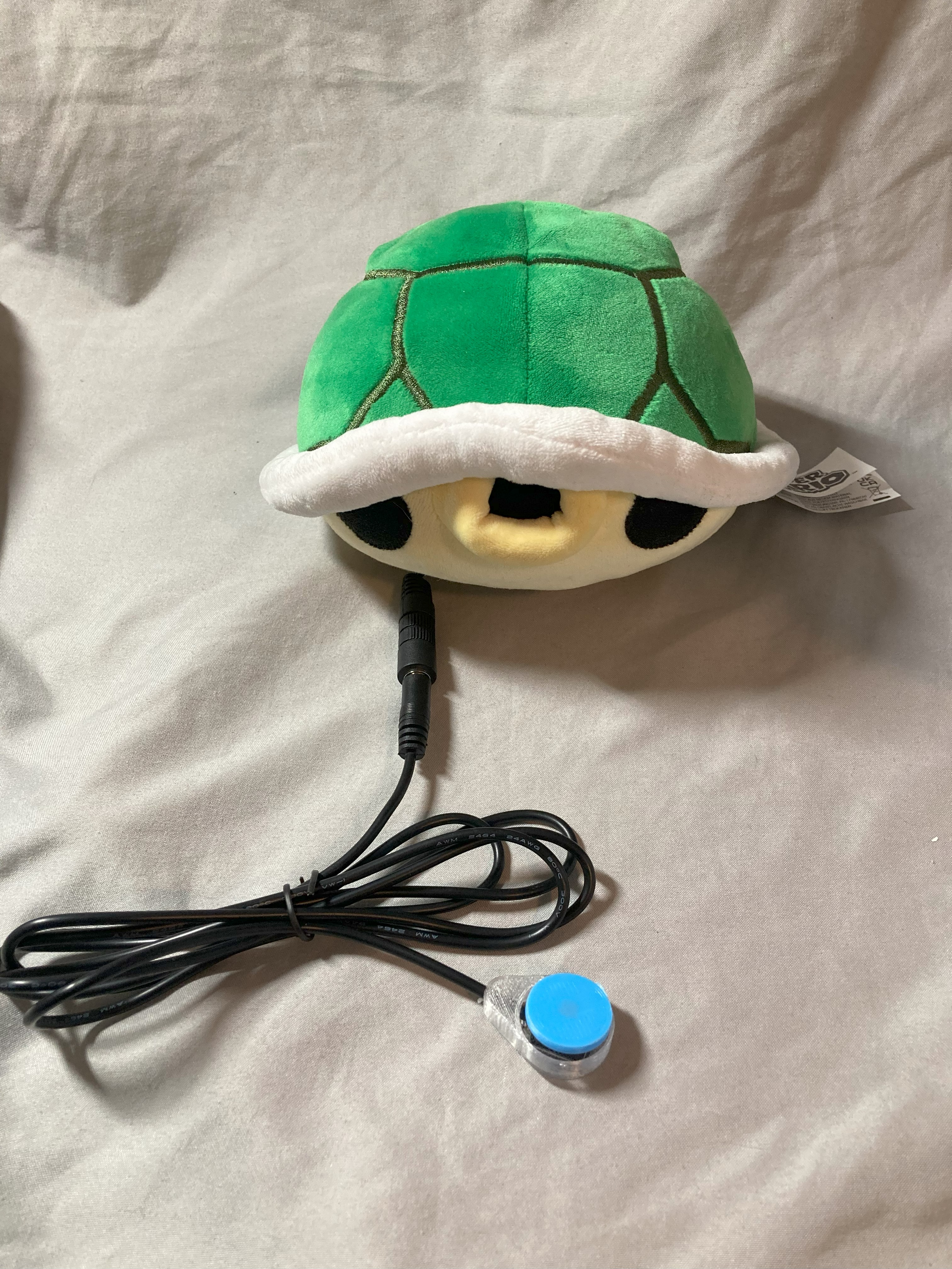 switch adapted mario shell with a switch plugged in