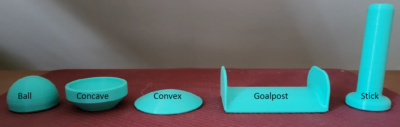 A photo of the available 3D printable Oak Joystick toppers, printed in teal PLA.
