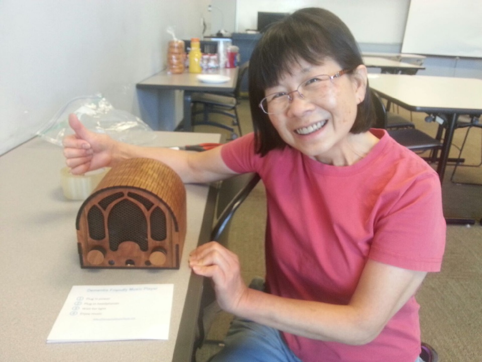 A volunteer with a Music Player device.