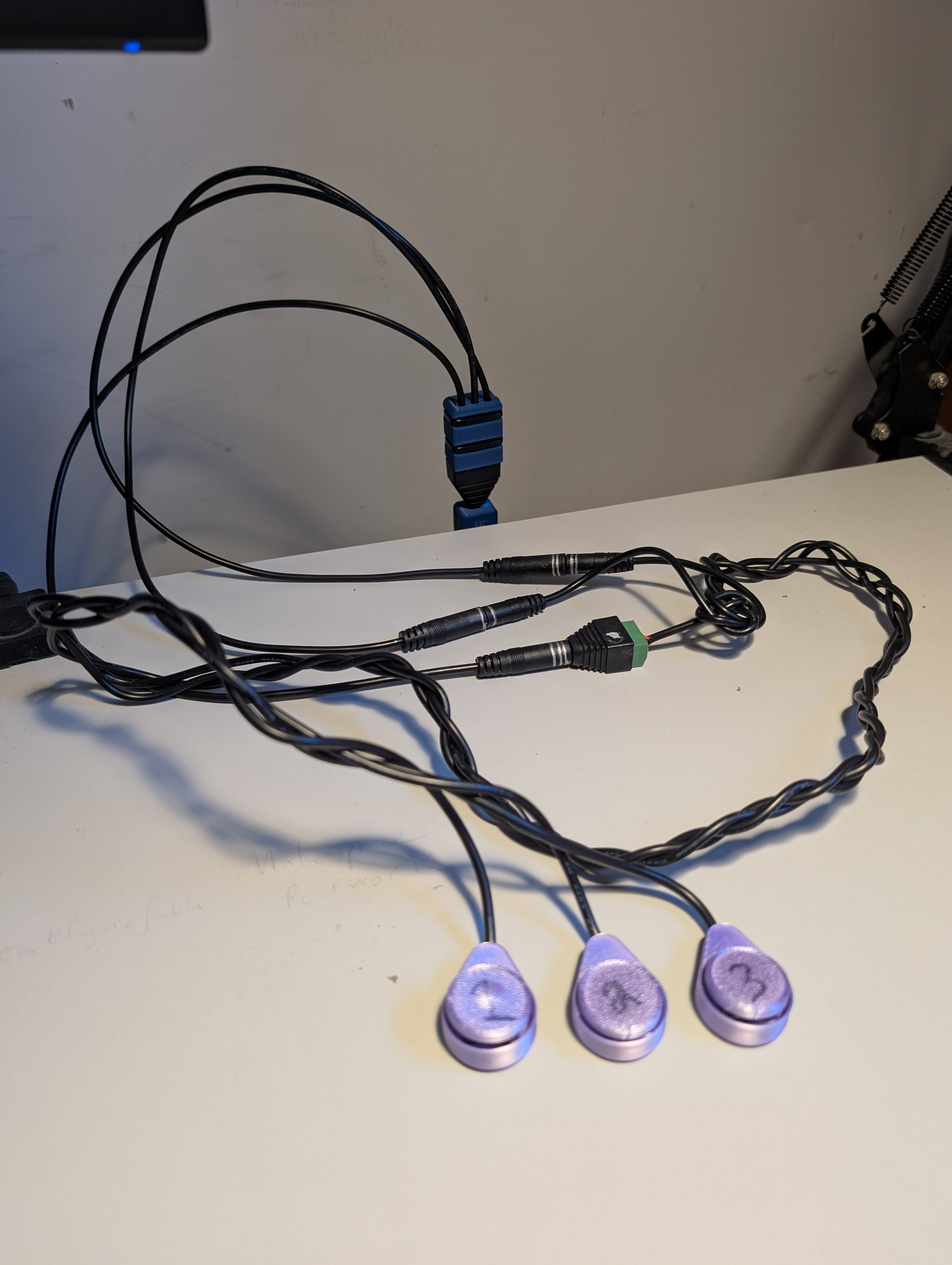 Shrub Hub plugged into a computer with three connected switches