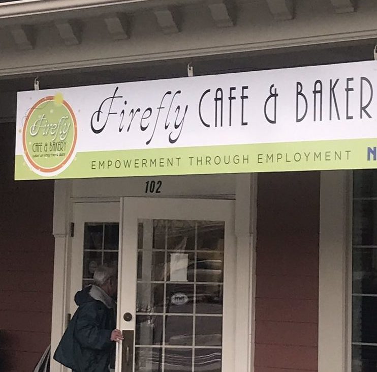 A banner outside of the Firefly Cafe & Bakery.