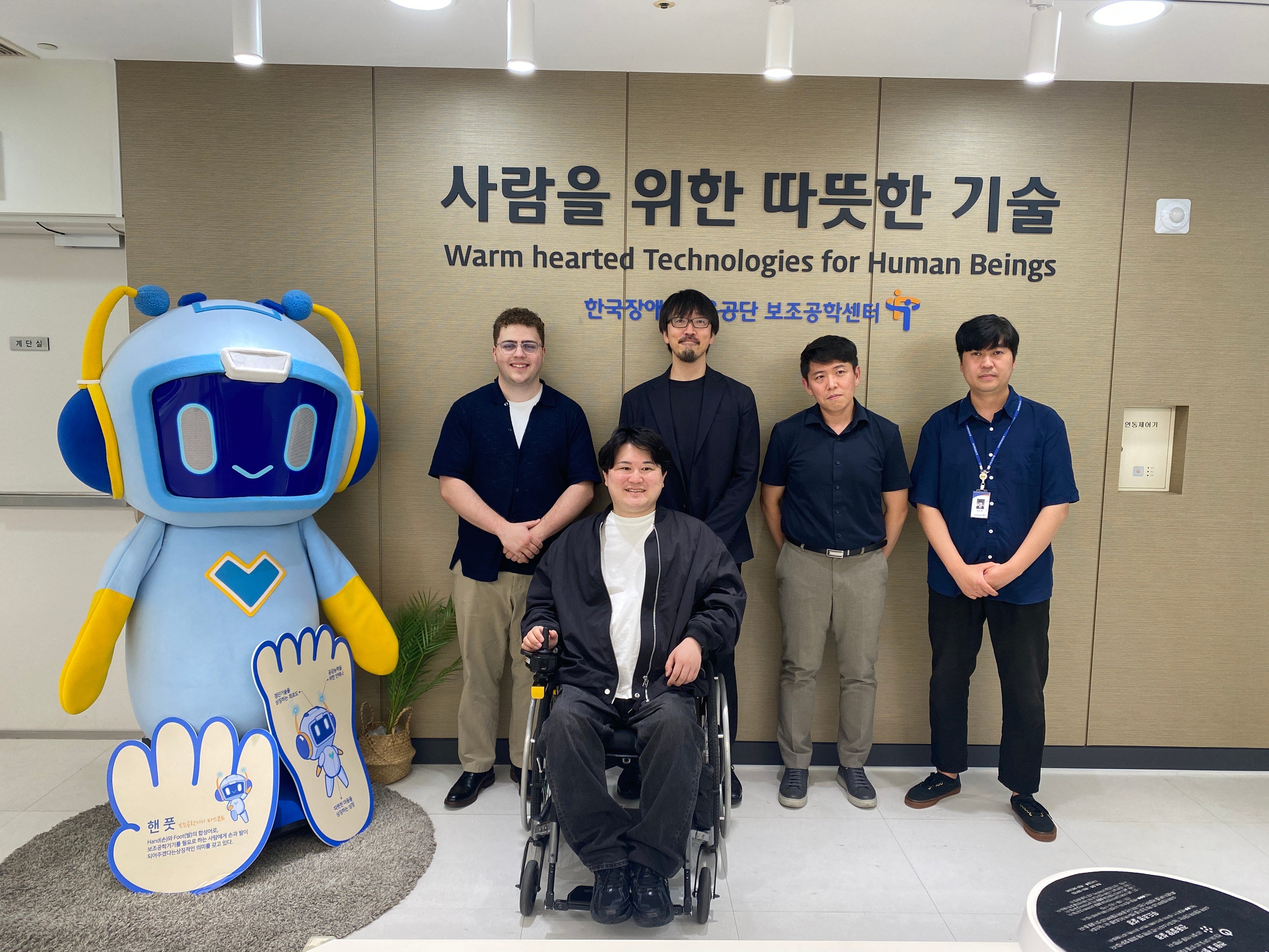 Tyler with delegates at the Korea Employment Agency for Persons with Disabilities.