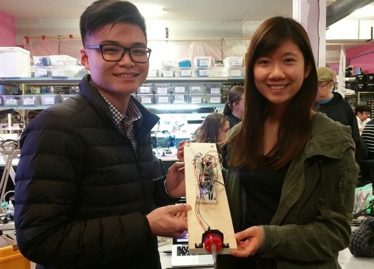 UBC capstone team members, (left) Albert and (right) Wen-Ling, showing off their work on an updated LipSync running on Adafruit Feather board