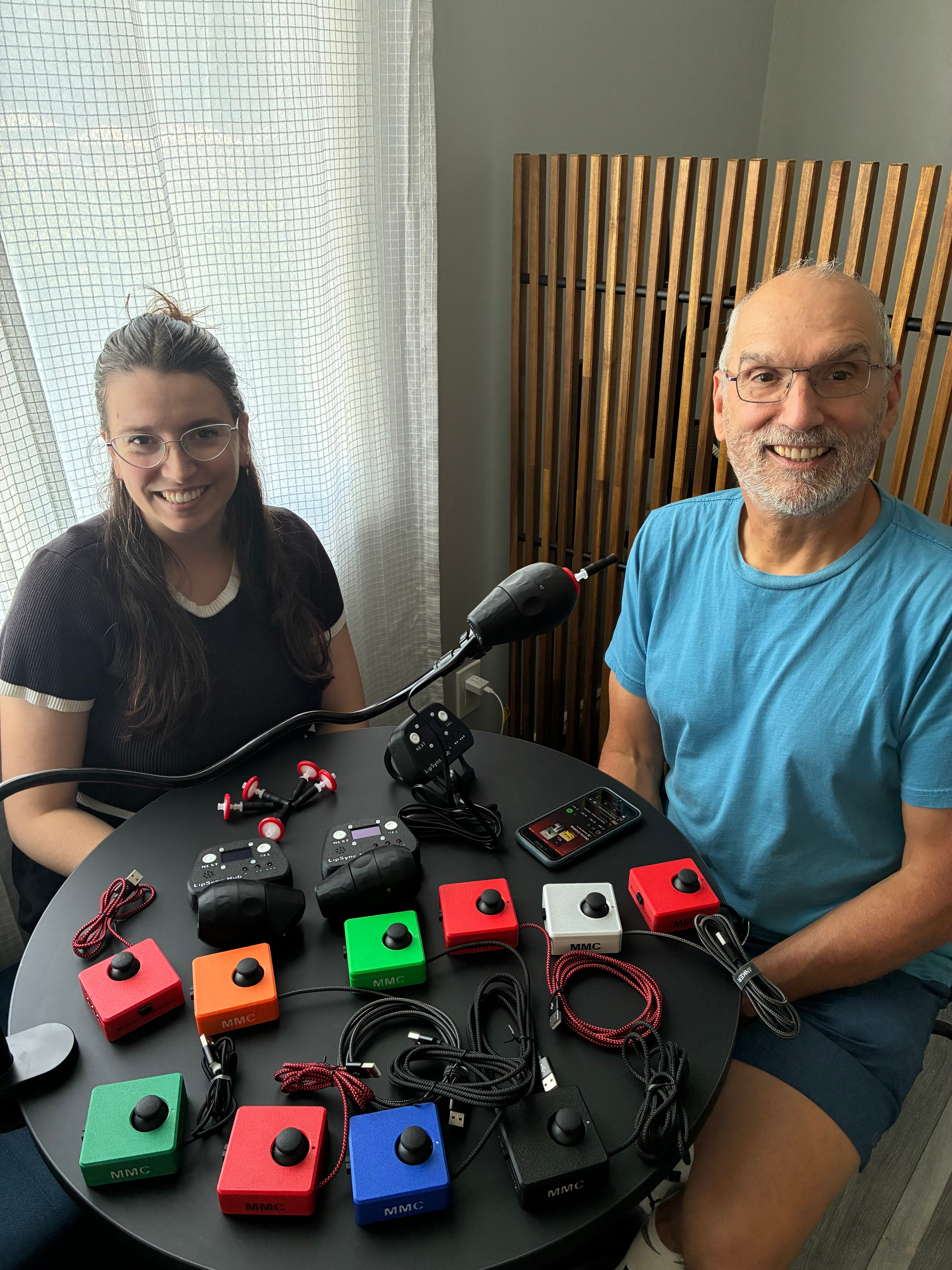 Alyssa and Jody showing off the devices they've built, including many Cedar joysticks and a LipSync.