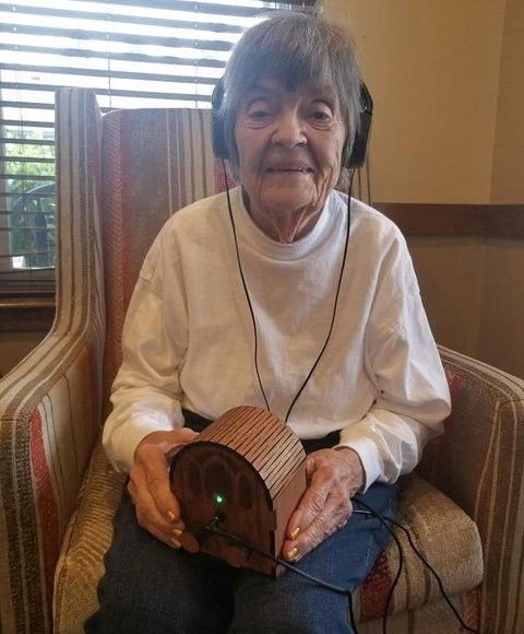 A user holding the Dementia Music Box.