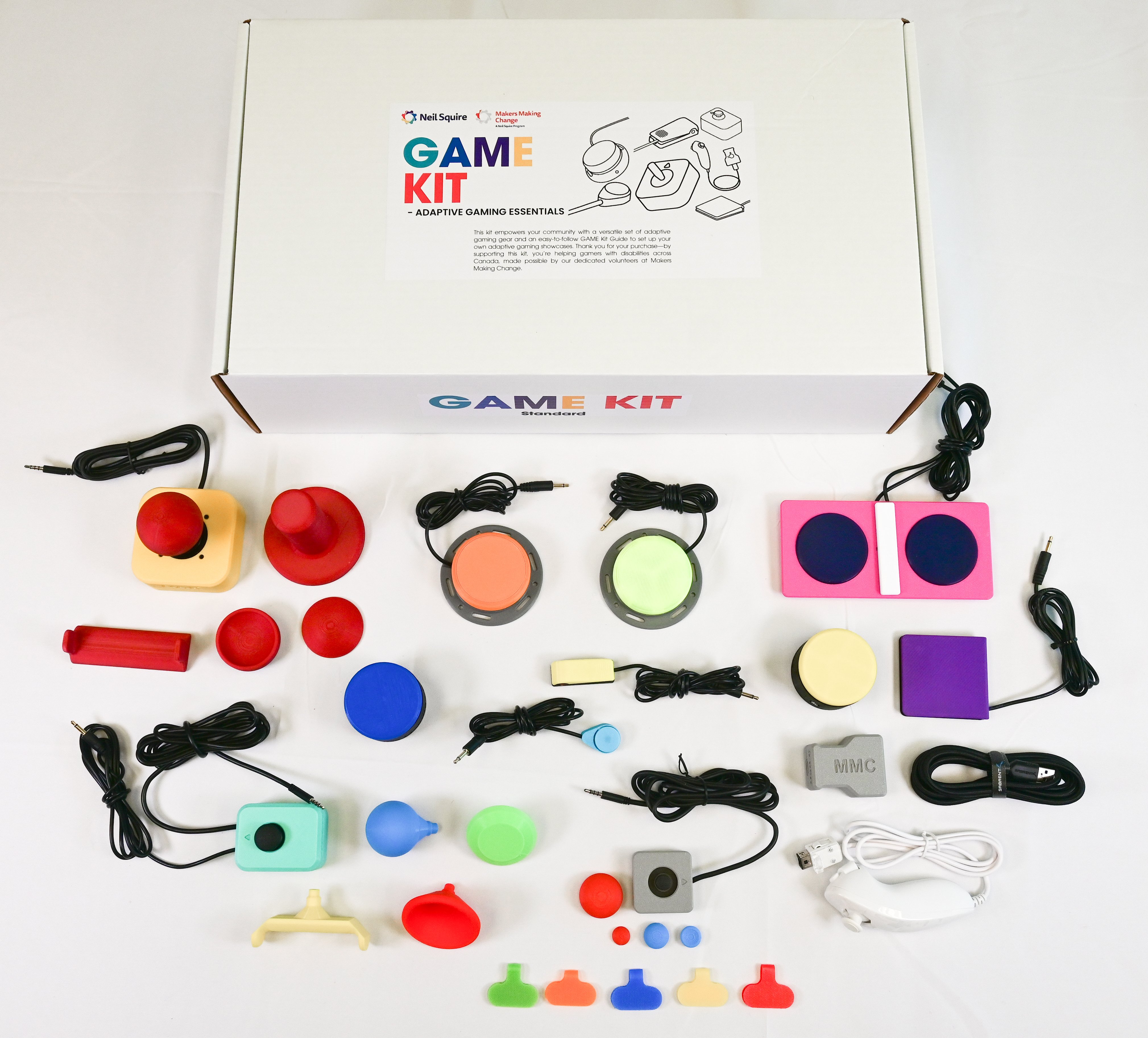 Top down view of the game kit box with the contents knolled out in front of the kit.
