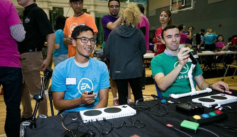 Two participants demoing assistive gaming.