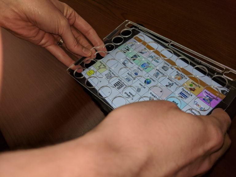 A laser-cut transparent keyguard.