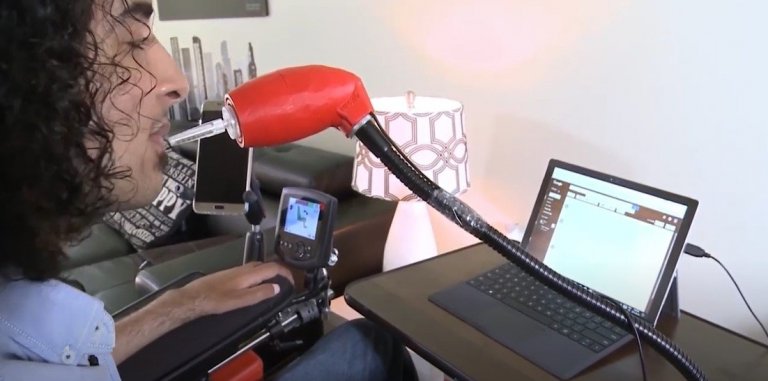 Omar using a LipSync device.