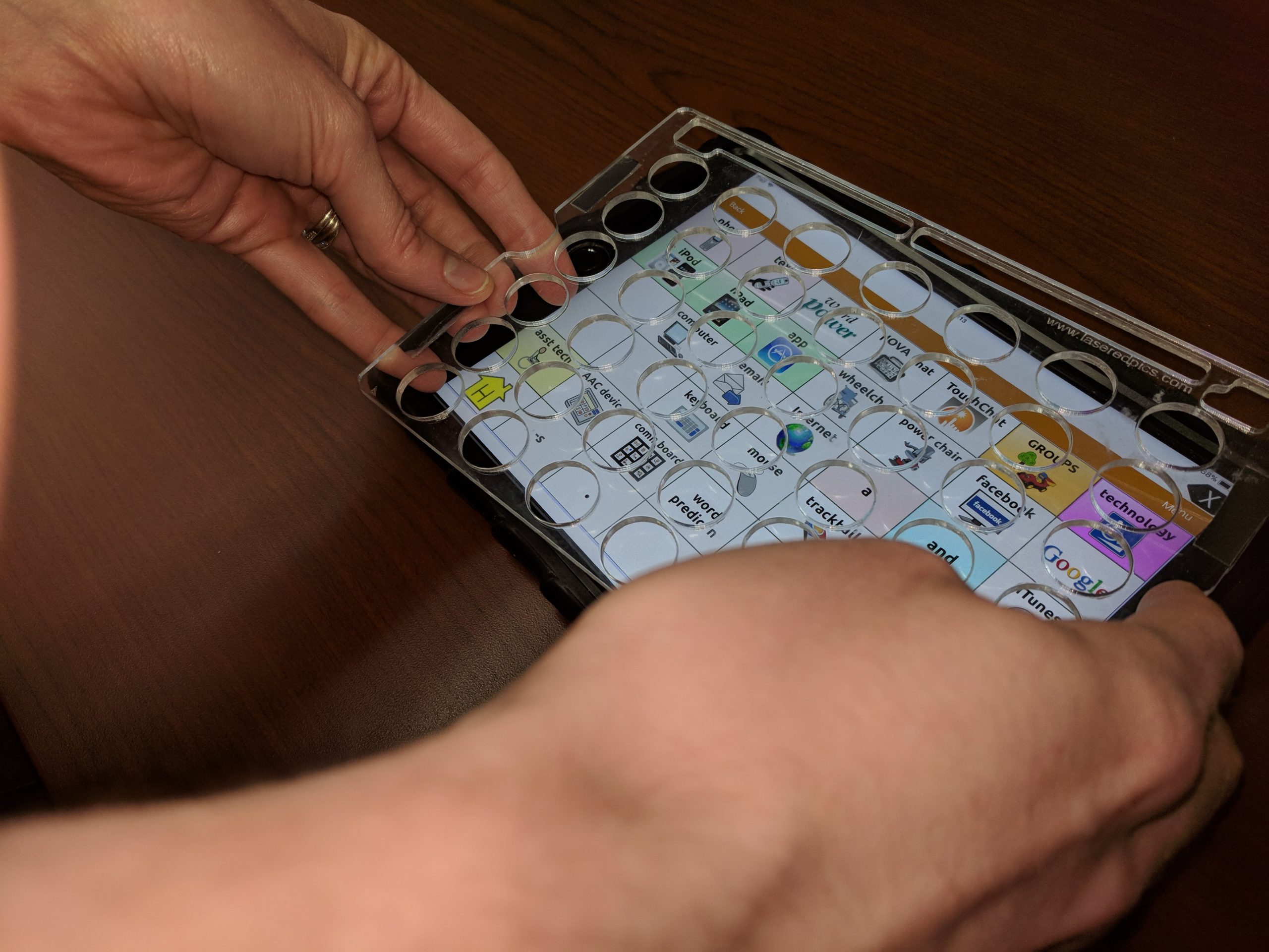 This is the Laser Cut Keyguards to help users press buttons accurately