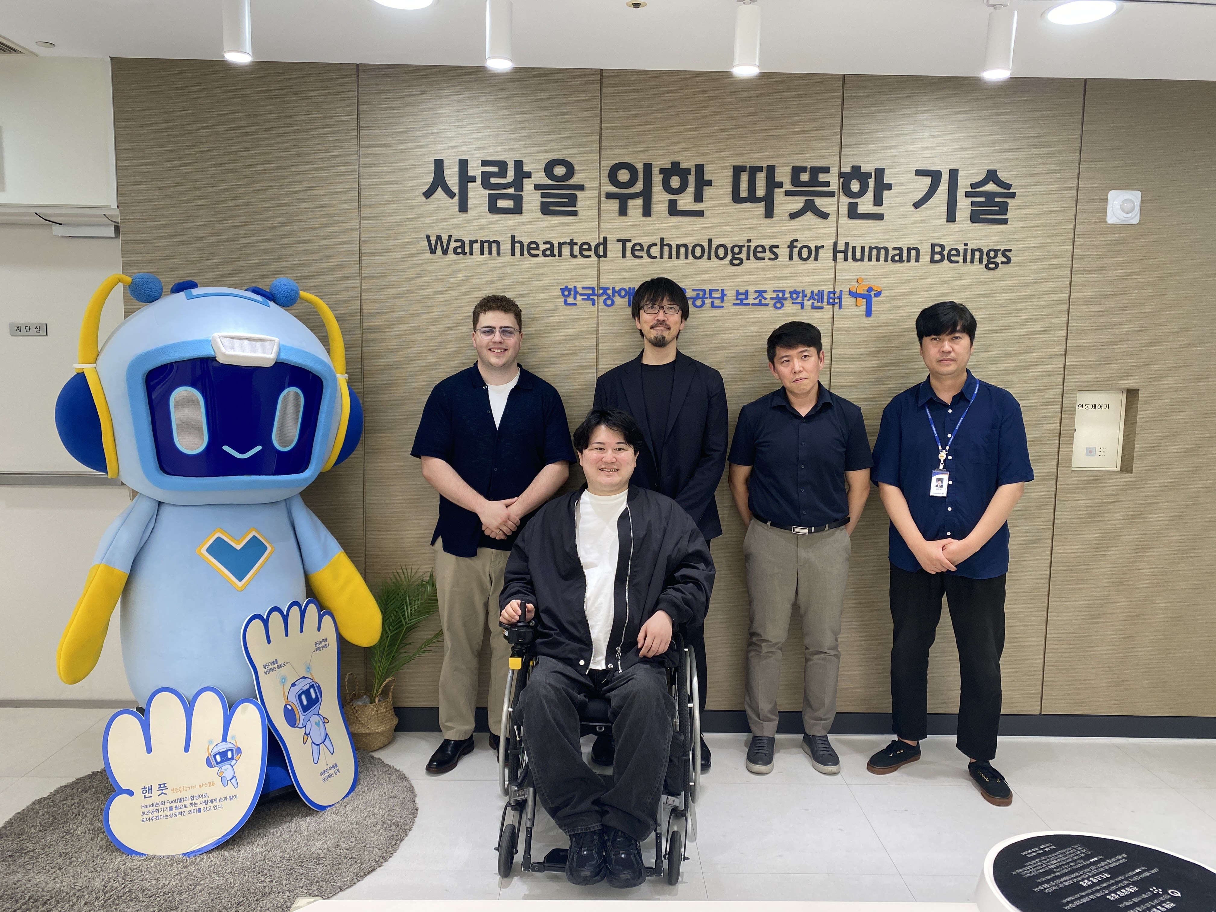 Tyler with delegates at the Korea Employment Agency for Persons with Disabilities.