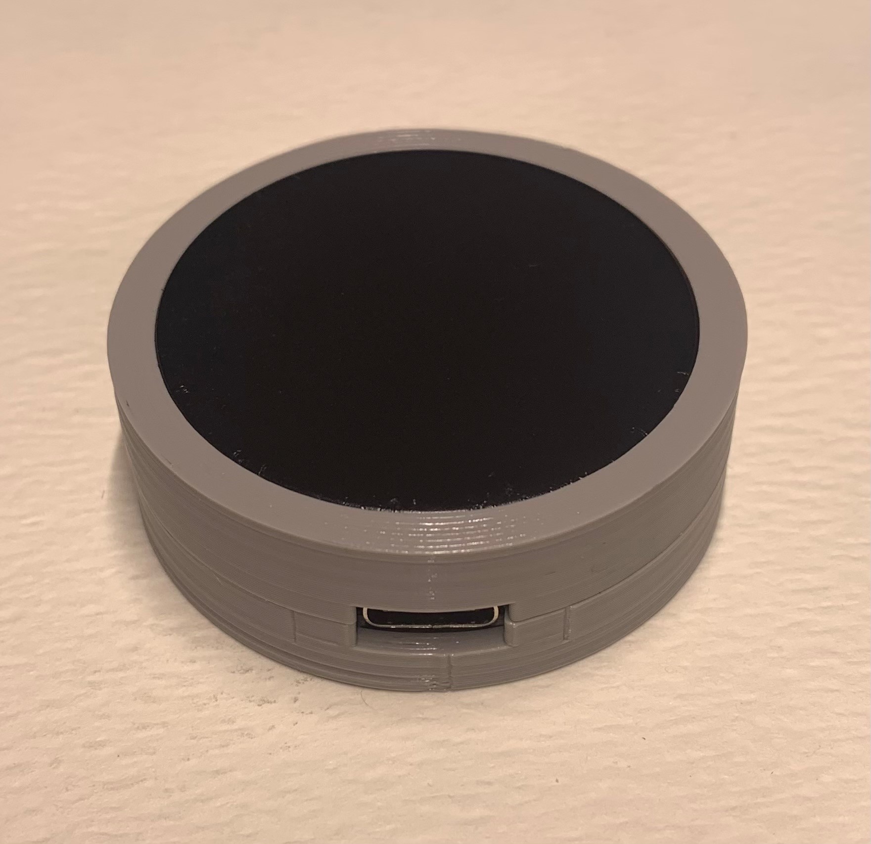 A photo of the assembled Touchpad Joystick, printed in grey PLA.
