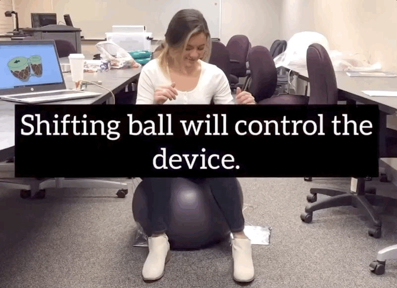 A GIF of someone using an exercise ball to control a device.