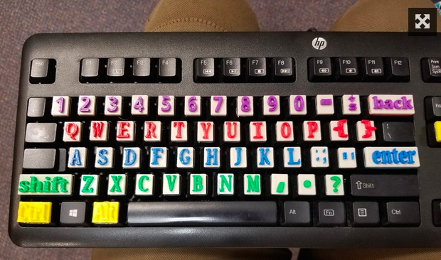 Raised keyboard letters.
