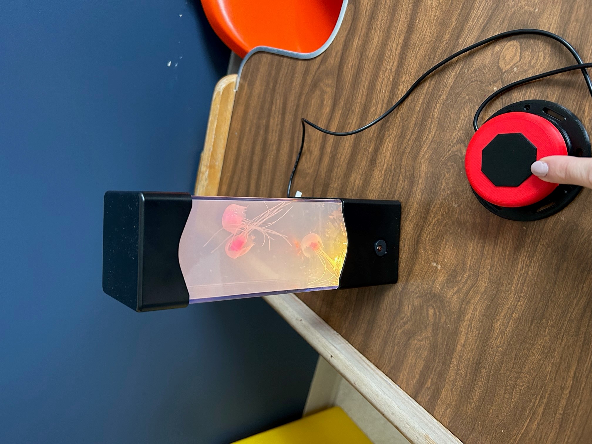 switch adapted lava lamp with a 3d printed switch plugged in