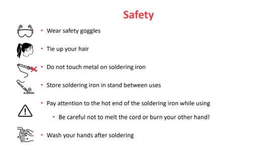 A slide showing solder safety tips including wear goggles, pay attention to the hot end.