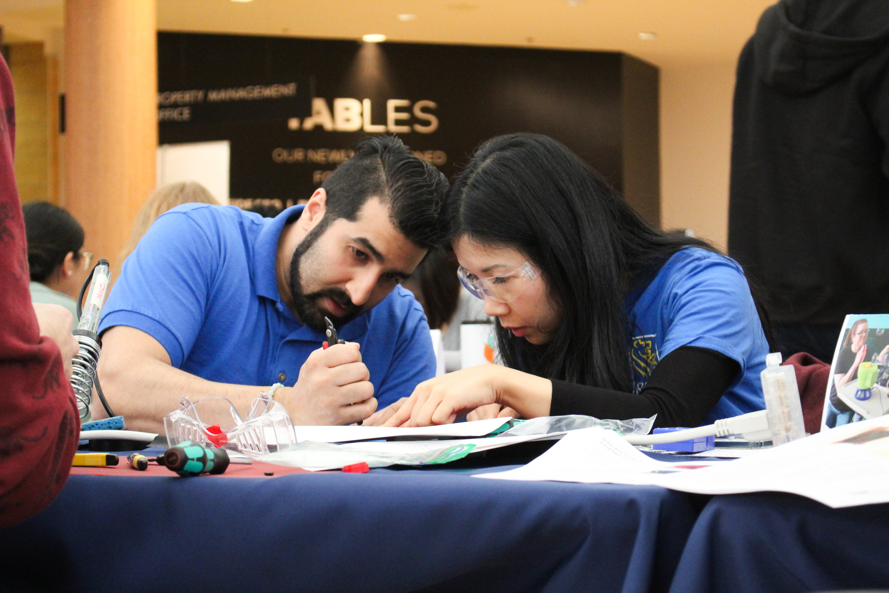 Two RBC employees hack together at the Hackathon.