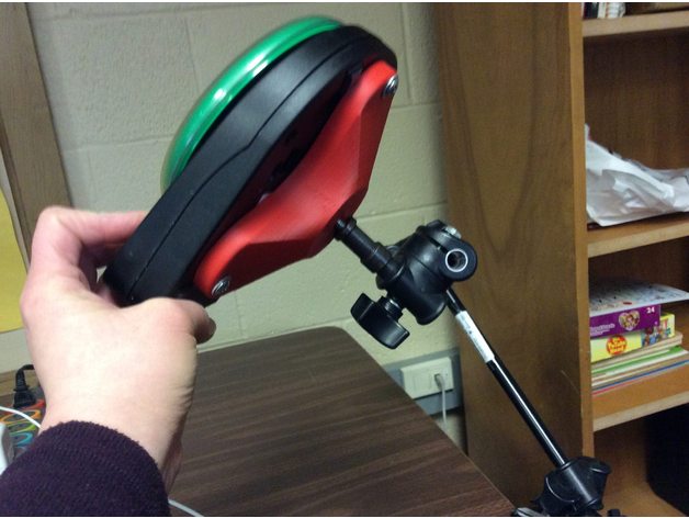 Assistive switch mounted using camera mount adapter