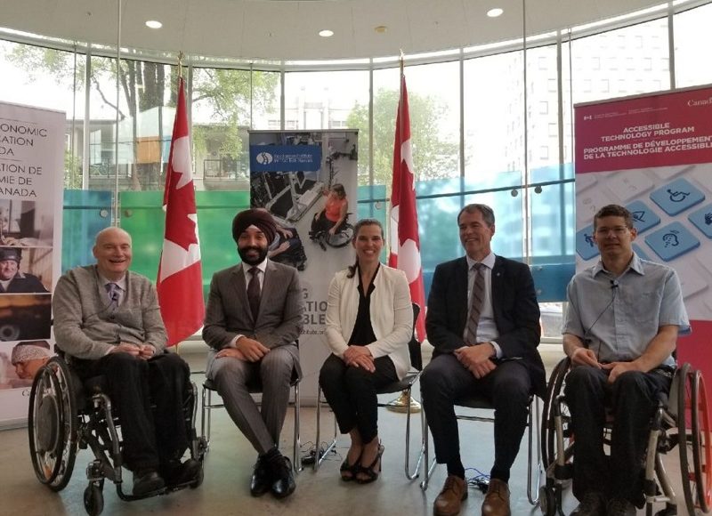 Five people pictured at a Government of Canada funding panel.