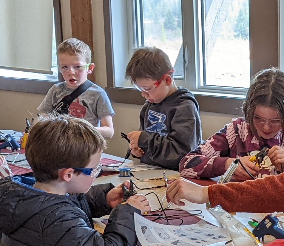 Children building assistive technology.