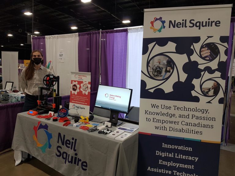 MMC staff at a booth.