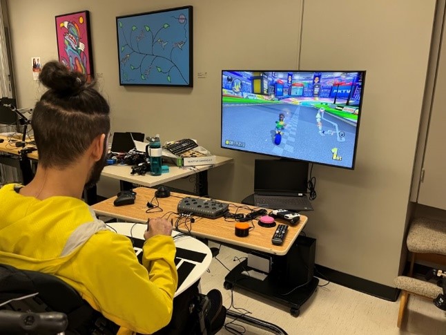A user playing mario kart with adaptive controls