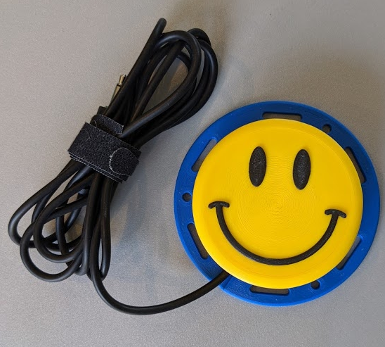 an interact switch with a smiley face