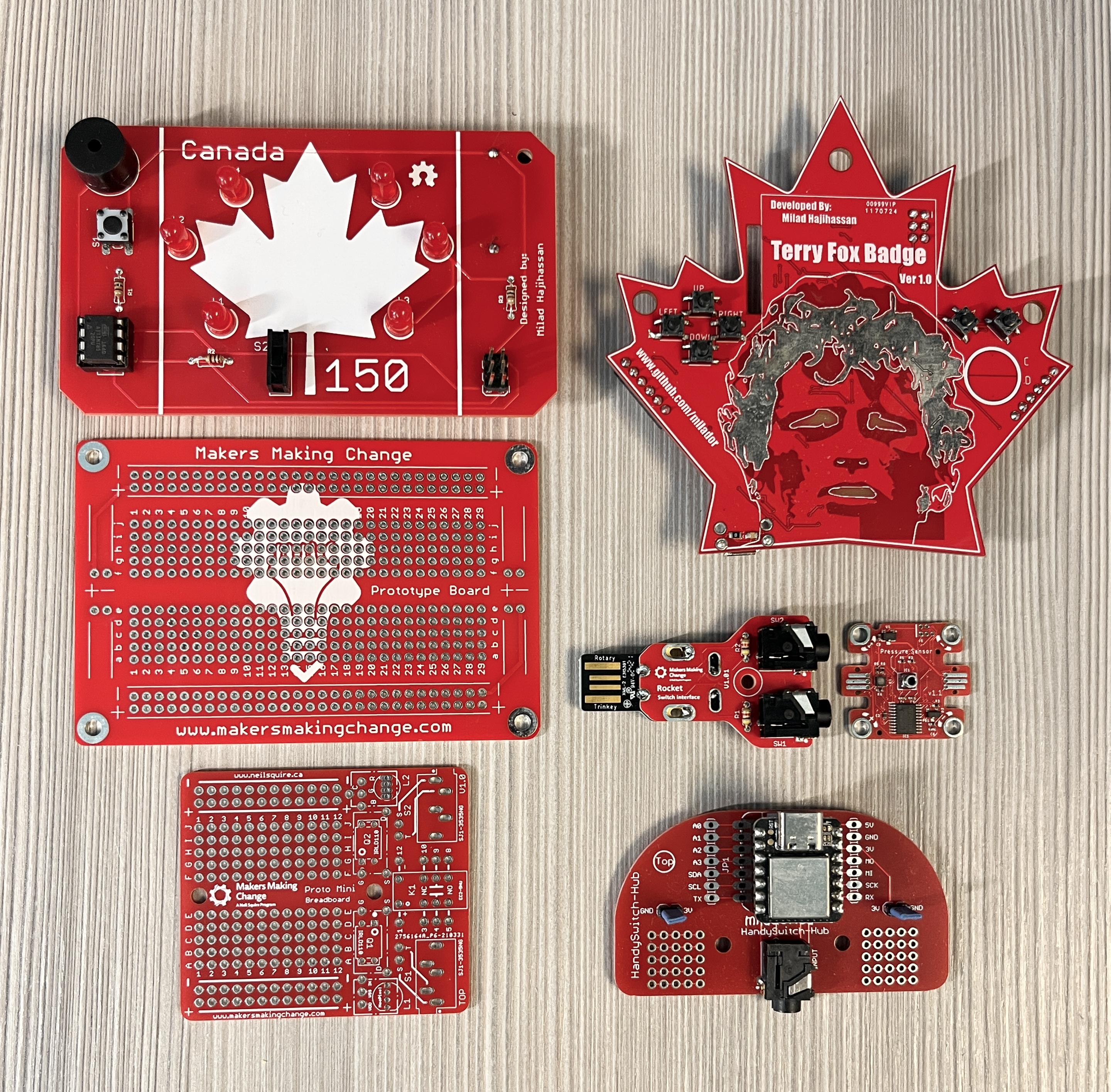 Six circuit boards that Milad designed, including a Maple Leaf badge, A Terry Fox badge, as well as proto boards that are used to test designs and teach soldering skills to students.