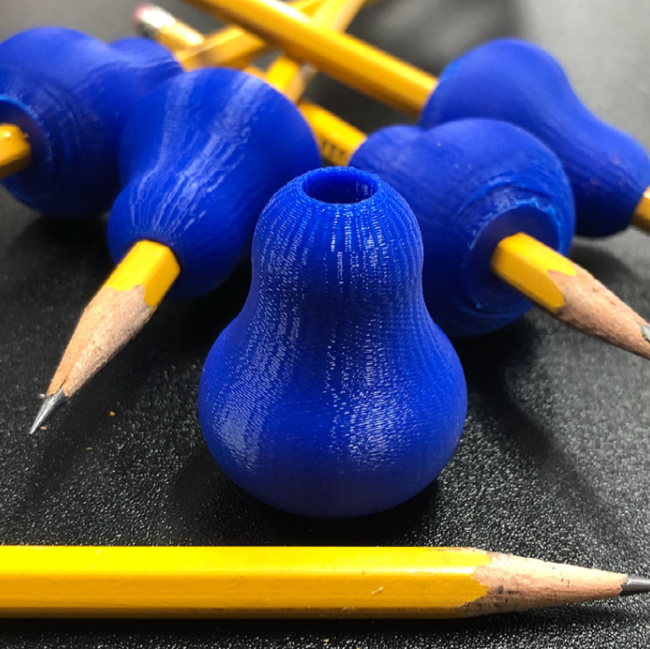 Five blue 3d printed pencil grips on yellow HB pencils.