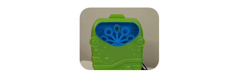 A green and blue bubble machine
