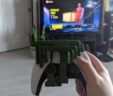 A xbox controller with 3d printed modifications to make the controller one handed.
